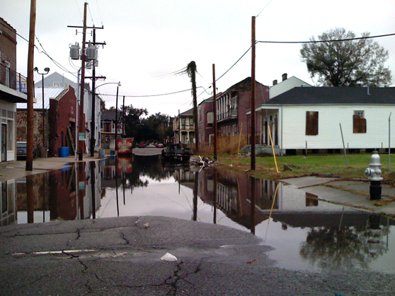 Street flooding in the Central City neighborhood after heavy rainfall.